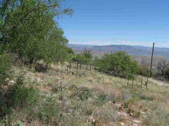 Insert 18. Fenced, unknown graves, strewn on slopes.jpg